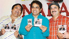 Vivek Shaque in the centre, hero of Nalayak releases films music cassettes and CDs at a function