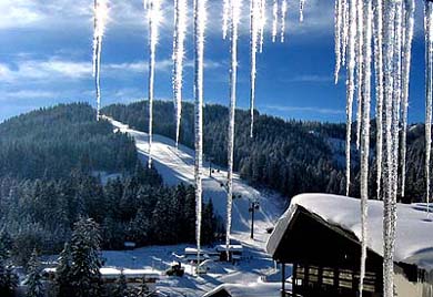 A freshly maintained slope awaits skiers in Fieberbrunn, western Austria, on Friday