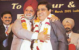The IDA president, Dr Bhagwant Singh, embraces the DCI president, Dr Anil Kohli, at a felicitation function organised by the local branch of Indian Dental Association at Ludhiana
