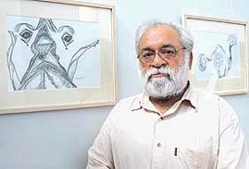 Dr Rakesh Gupta from JNU, Delhi, with his works at the Fine Arts Museum and Art Gallery in Panjab University