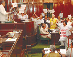 BJP MLAs protesting against the Congress-led government even as the Lt-Governor, Mr B. L. Joshi, continues to read out the Budget speech in the Capital on Tuesday.