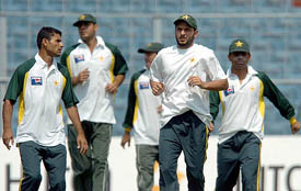 Pakistani cricketers jog during a practice session in Kolkata on Tuesday