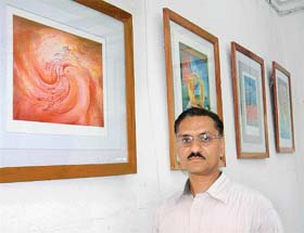 Painter Jaswant Singh with his creations at a solo exhibition in city