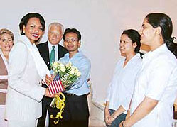 Three Patiala students, who represented India in the Space Settlement Design Competition held in the USA in July 2004, with the visiting U.S. Secretary of State Condoleezza Rice in New Delhi, on Wednesday. Also seen in the picture are Ambassador David C. Mulford and Mrs Mulford.