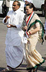Congress President and UPA Chairperson Sonia Gandhi with Andhra Pradesh Chief Minister Y S R Rajashekhar Reddy after her arrival in Hyderabad