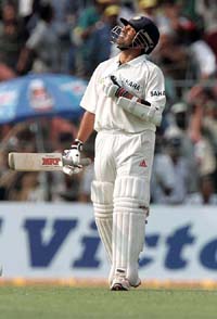 Sachin Tendulkar looks to the sky during the first days play of the second Test in Kolkata on Wednesday