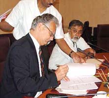 Louis De Jonghe, Country Director, Asian Development Bank, signs a loan agreement for $250 million for a Multisector Project for infrastructure rehabilitation in Jammu and Kashmir.