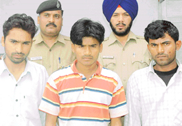 Three persons, accused of stealing LPG cylinders from the city, in police custody in the Sector 11 police station in Chandigarh on Thursday.