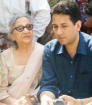 Zarin Musharraf, mother of Pakistan President General Pervez Musharraf, with her grandson Bilal during a visit to Naharwali Haveli