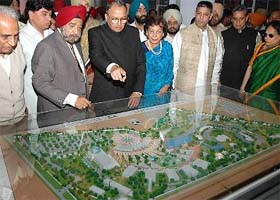 Gen S.F. Rodrigues, Governor of Punjab, discusses details of the model of Pushpa Gujral Science City with Dr R.S. Khandpur, Director-General, after the first phase of the science city was inaugurated in Kapurthala