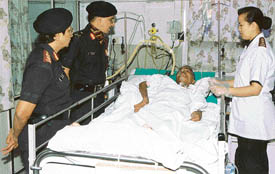 Maj-Gen (now Lieut-Gen) B. Sadananda, during whose stewardship, the Command Hospital, Chandimandir, was declared as the best hospital in 2003, observing a patient put on ventilator.
