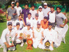 Players of the Minarva Academy Cricket Club after winning the 10th Prudential Cricket League Cricket Tournament in Chandigarh on Monday.