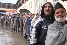 Kashmiris queue up for the distribution of forms for the Srinagar- Muzaffarabad bus service