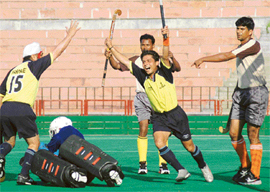 Vikram Saini of Punjab AG exulting after scoring the first goal for his team against AG Orissa in the final of the All-India Inter Audit (Inter Zonal) Tournament in Chandigarh on Tuesday. 