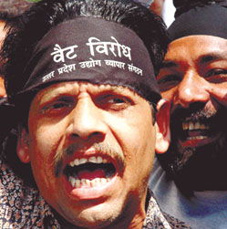 An activist of the Uttar Pradesh Udyog Vyapar Sangathan protesting against VAT at Jantar Mantar in the Capital on Tuesday.