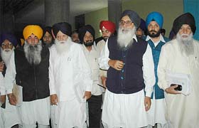 Opposition MLAs come out of the Punjab Vidhan Sabha after boycotting the Budget presentation in Chandigarh
