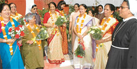 Teachers of Sacred Heart Senior Secondary School, Sector 26, interact with the Principal, Sister Sebstina, at their farewell function held at the school premises in Chandigarh on Wednesday.