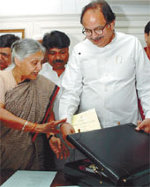 Chief Minister Sheila Dikshit in discussion with Finance Minister Dr A.K. Walia just before the presentation of the Budget in the Capital.