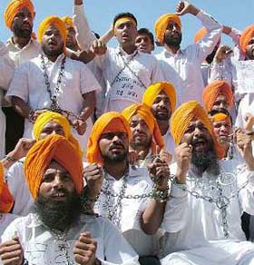 Members of the Unemployed Elementary Teachers Union hold a rally against contractual appointments in government schools in Jalandhar