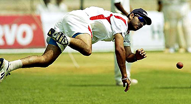 Yuvraj Singh throws a ball during a practice session in Bangalore on Wednesday