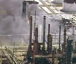 A video grab shows smoke rising from a BP oil refinery in Texas City, Texas, following a powerful explosion on Wednesday