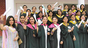 Students of Hans Raj Mahila Maha Vidyalaya celebrate after receiving their degrees