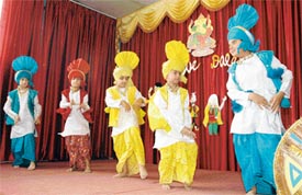 Students perform bhangra at the Love Dale school in Ludhiana