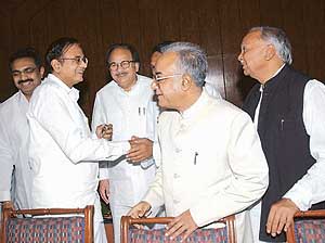 Union Finance Minister P. Chidambaram with state Finance Ministers during a meeting on value added tax in New Delhi on Thursday. 