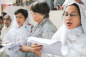 Devotees take part in Good Friday prayer at Sector-18 Church in Chandigarh on Friday. 
