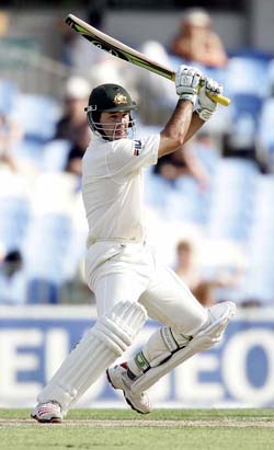 Australia's captain Ricky Ponting smashes the ball through the off side during his knock of 105 against New Zealand in Auckland on Sunday