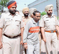 Ramanand (in track suit), was re-arrested by the police in Ludhiana on Monday.
