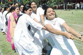 Girls try hard to win the tug of war at the annual sports day at Dev Samaj College of Education, Sector 36, Chandigarh
