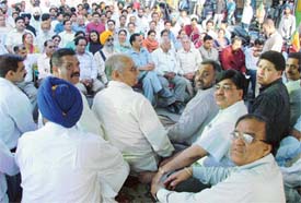The state unit president of the BJP addresses a party rally against VAT in Ludhiana