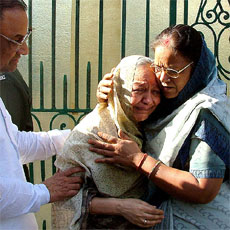 Close relatives of the Jindal family console each other after hearing the news about O.P. Jindals death in a helicopter crash at Jindal House in New Delhi on Thursday. 
