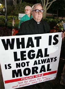Chaplain John Butler Book shows his support for Terri Schiavo outside the Woodside Hospice in Pinellas Park, Florida, on Wednesday.
