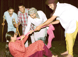 Artistes perform in a play, Dhian Wale, Putran Wale, that was staged at the Tagore Theatre in Chandigarh on Thursday. 