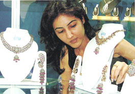 Jewellery designer Nidhi with her creation at the inauguration of Zak Jewels 2005 at Pragati Maidan in the Capital.