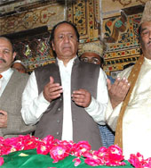 Former Pakistan Prime Minister Shujaat Hussain offers namaz at the dargah of Khwaja Nizamuddin Aulia in New Delhi on Friday. 