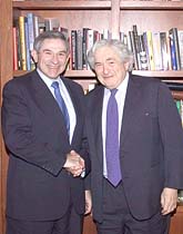 The current World Bank President James D. Wolfensohn greets World Bank President-designate Paul Wolfowitz prior to a meeting at the World Bank in Washington on Thursday.
