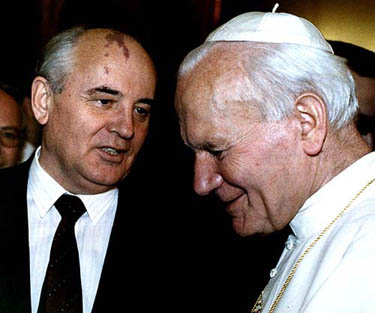 Pope John Paul II (R) meets former Soviet President Mikhail Gorbachev at a private audience at the Vatican on November 18, 2000. Roman Catholics around the world waited and prayed as Pope John Paul slid toward death on Saturday, after a 26-year reign that helped undermine Soviet communism and vigorously upheld long-standing Vatican doctrines.