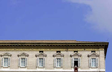 Pope John Paul II appears at the window of his private apartments at the Vatican on March 30, 2005. The Pope failed in his efforts to talk in public on Wednesday for the second time in four days, again fuelling widespread concern about his ability to recover from recent throat surgery.