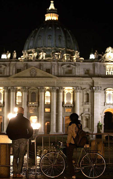 Faithful waits for news about the health of Pope John Paul in Saint Peter's Basilica at the Vatican, March 31.