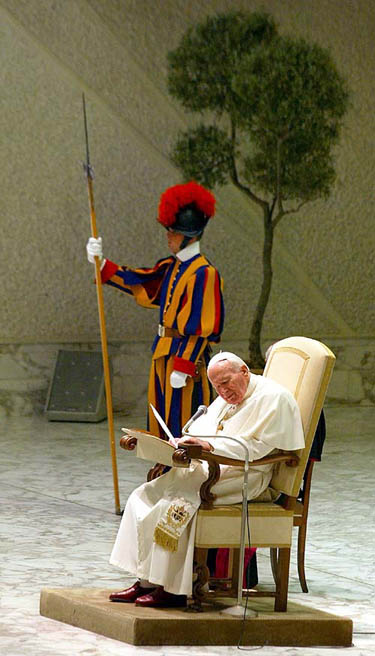 Pope John Paul II sits on his chair during a special audience in the Paul VI Hall at The Vatican on May 19. Pope John Paul's health deteriorated suddenly on Thursday, and he received the Roman Catholic sacrament reserved for the sick and dying