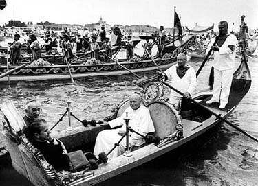 Pope John Paul II in a gondola in the grand canal of the Venice lagoon during the Pontiff's visit to Venice on June 16, 1985. 