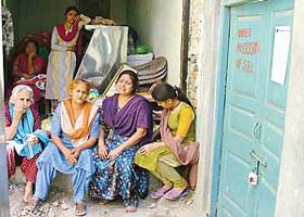 A tenant family that was displaced after the SBI authorities sealed the residential property of Saini Motors near Mata Rani Chowk in Ludhiana