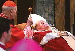 The body of Pope John Paul II lies in state in the Clementina Hall at the Vatican on Sunday.