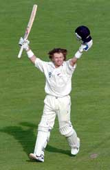 New Zealands Hamish Marshall rejoices on completing his century against Sri Lanka on the first day of the first Test at Napier in New Zealand on Monday