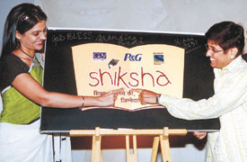 Mandira Bedi and Kiran Bedi at the launch of children education campaign Shiksha in the Capital on Tuesday
