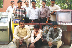 Three persons arrested by the Delhi Police Crime Branch for running a gambling den in a video game parlour in the Capital