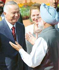 President of the Republic of Uzbekistan Islam A. Karimov with Prime Minister Manmohan Singh during a ceremonial reception at Rashtrapati Bhavan in New Delhi on Tuesday. 